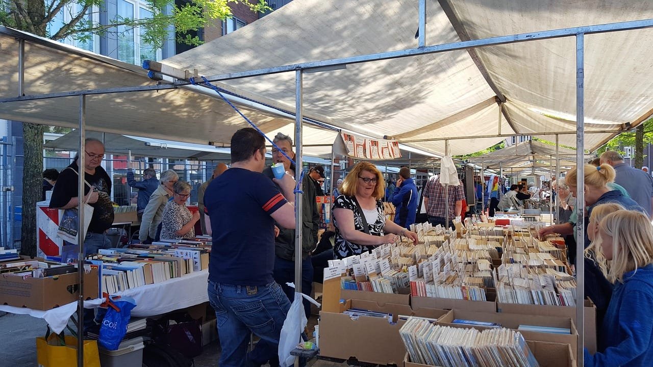 Free Book Promo Book Market Free Book Promo Hero Image of an outdoor book market.